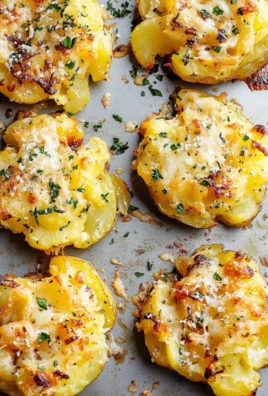 Crispy Smashed Potatoes with Garlic & Cheese